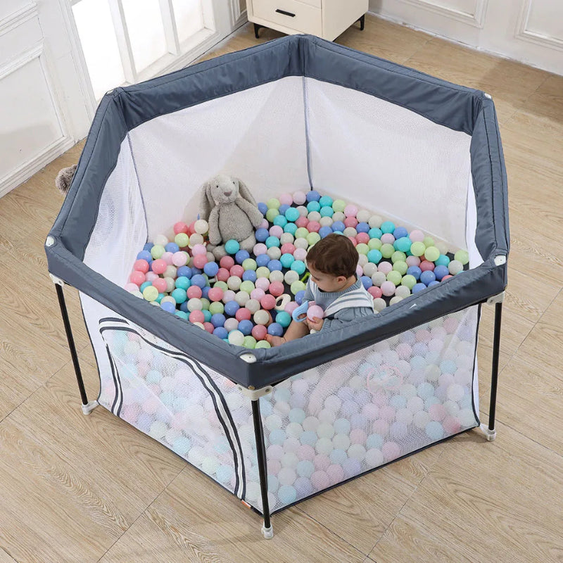 Parc bebe pliable rond en tissu vue du haut
